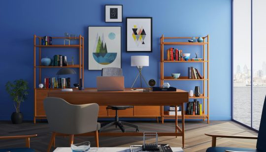 Brown Wooden Desk With Rolling Chair and Shelves Near Window